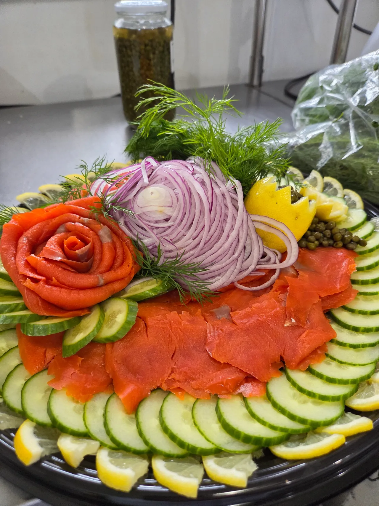 B's Bagels Lox Board — wild Alaskan sockeye lox with cucumber, red onion, capers, lemon and dill